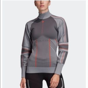 Adidas Stella McCartney Run OD Midlayer gray and orange top.